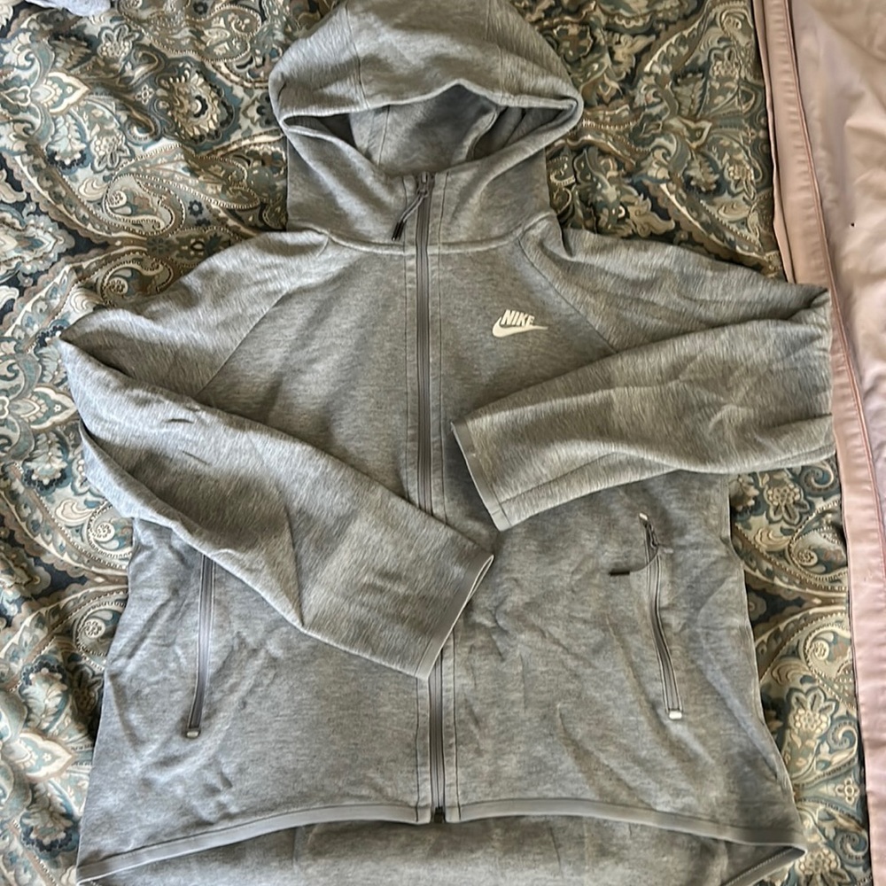 Gray NIKE zip up hoodie. Size S